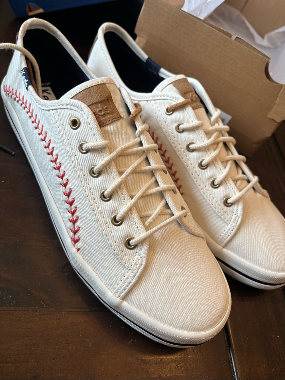 Keds White Sneakers with Navy Lining and Tan Tongue Accent